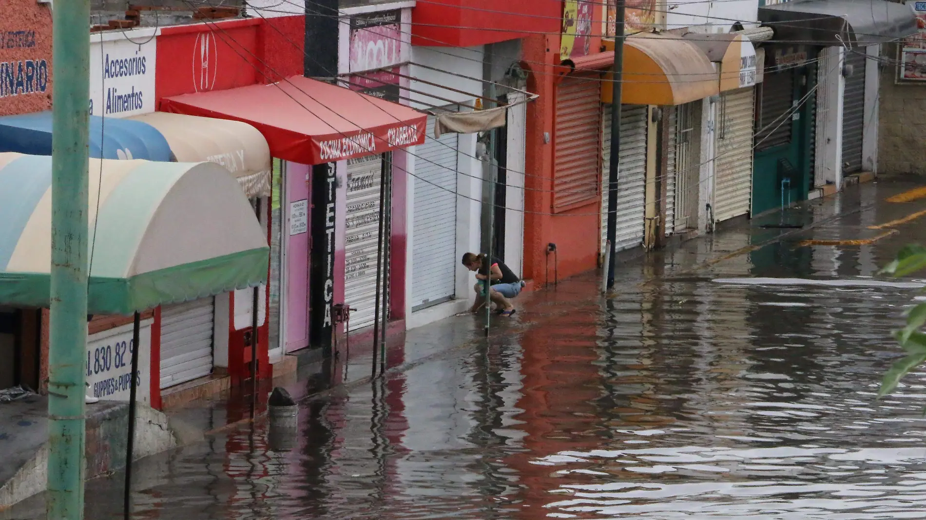 negocios afectados por inundaciones (2)